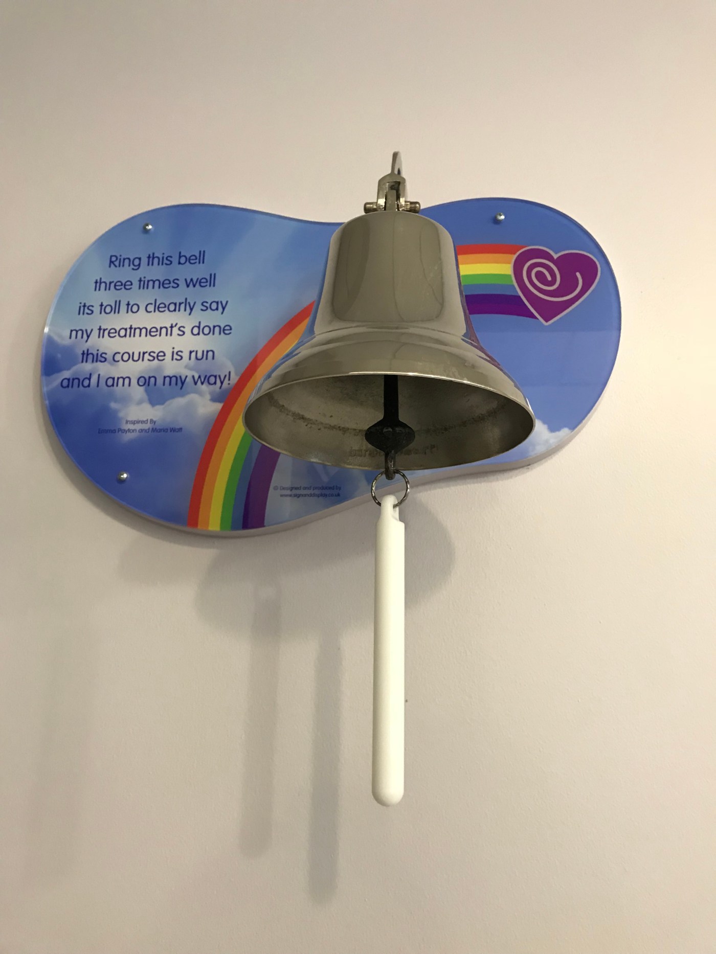 Wall mounted bell that patients ring at the end of their course of radiotherapy